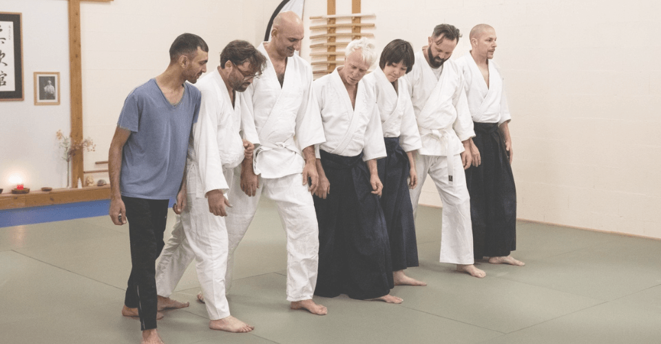 cours du sport aikido avec des migrants adultes