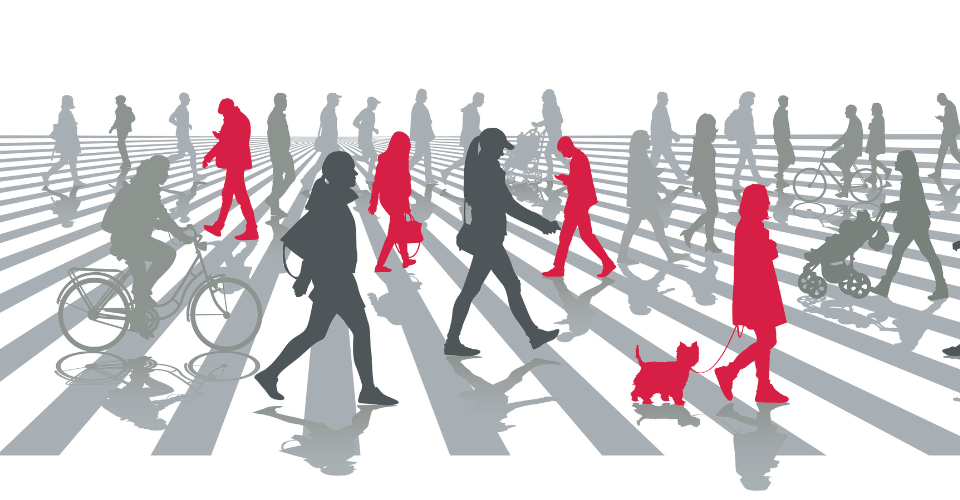 foule représentant une population variée sur un passage piéton